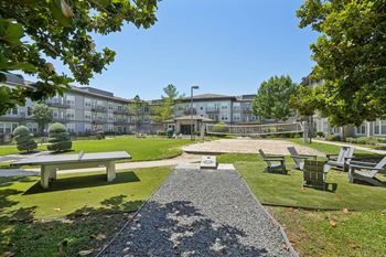 Outdoor recreation area with fire pit and seating